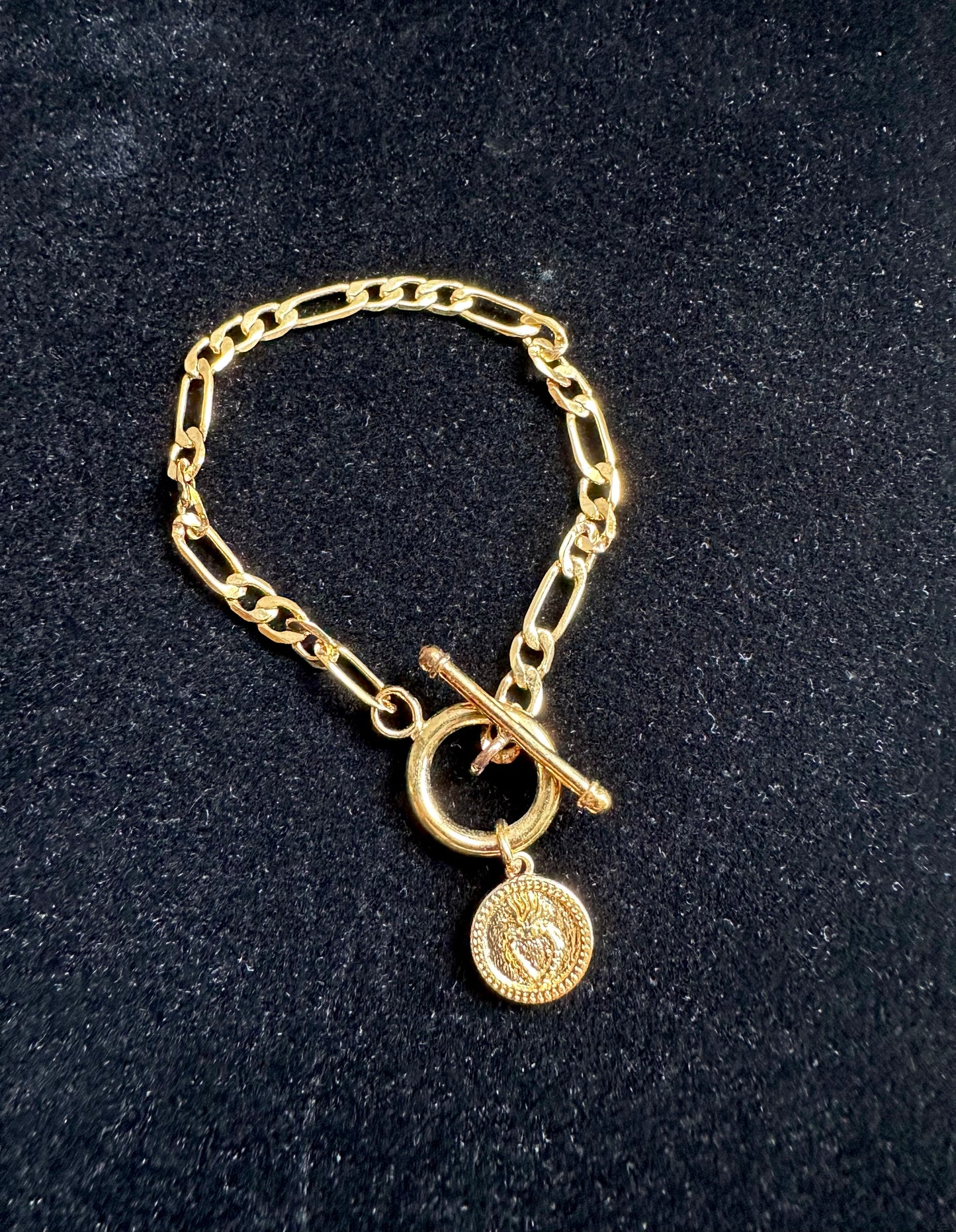 PULSERA CORAZÓN CRUZADO